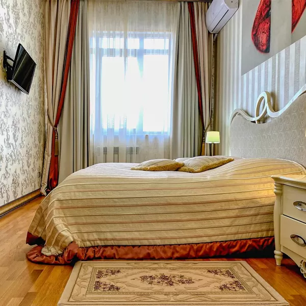 Номер Романтический люкс в санатории Целебный Нарзан в городе Кисловодске - фотография