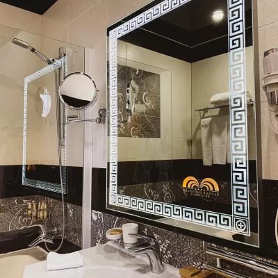 Номер Студия люкс в санатории Целебный Нарзан в городе Кисловодске - фотография