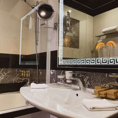 Номер Студия люкс в санатории Целебный Нарзан в городе Кисловодске - фотография